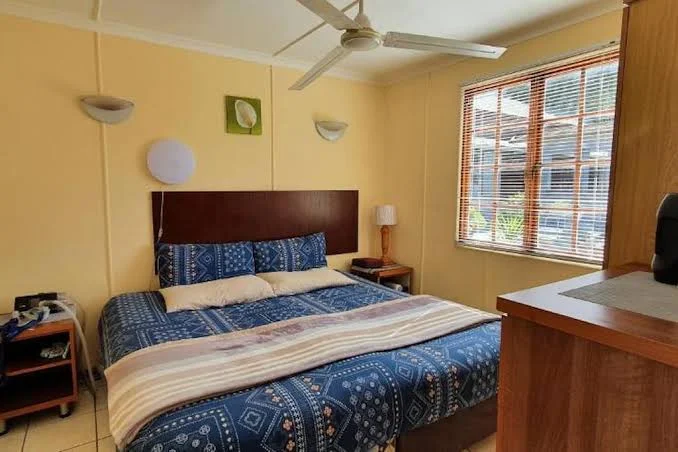 Comfortable bedroom at Hopefield Garden Lodge