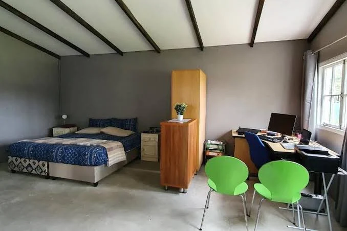 Studio-style room with workspace at Hopefield Garden Lodge